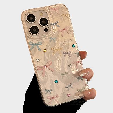 Bow Accent Phone Case with Textured Wave Finish and Decorative Crystal Details