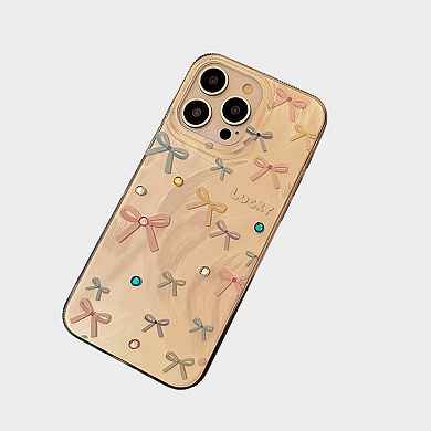 Bow Accent Phone Case with Textured Wave Finish and Decorative Crystal Details