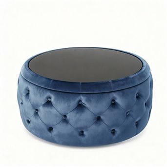 Modern round coffee table with velvet cushions and a tempered glass top