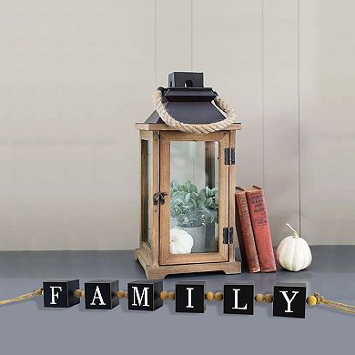 HomeRoots 24" Black And White Wood Family Decorative Tassel