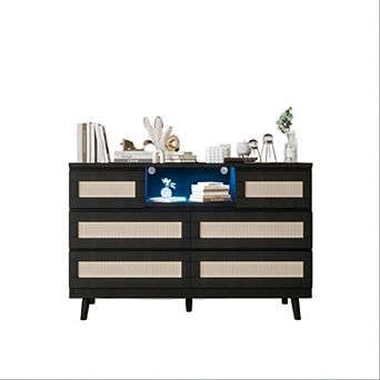 6-drawer rattan dresser features LED light, charging station & TV stand function.