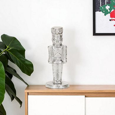 HomeRoots 7" Silver Cast Iron Christmas Nutcracker Hand Painted Figurine