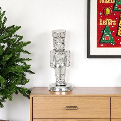 HomeRoots 6" Silver Cast Iron Christmas Nutcracker Hand Painted Figurine