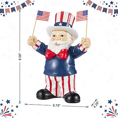 Glitzhome 9"H Patriotic/ Americana Polyresin Santa holding flags Table Decor