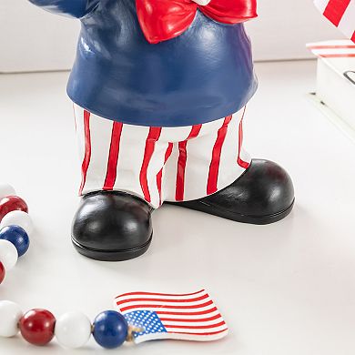 Glitzhome 9"H Patriotic/ Americana Polyresin Santa holding flags Table Decor