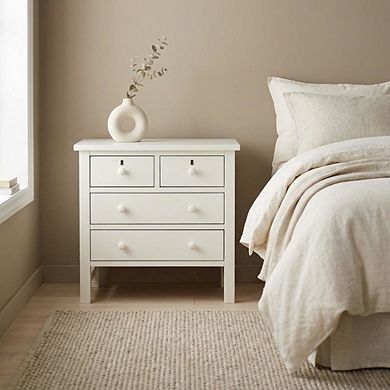 Antique White Nightstand with 4 Drawers and Faux Keyhole Accents