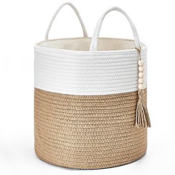 A woven rope storage basket with a handle, suitable for storing blankets, toys, and clothes.