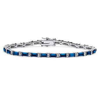 Simulated Birthstone Silvertone Tennis Bracelet 7.5"