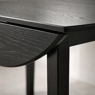 GOMYHOME Extendable Round Dining Table, Solid Wood Base Drop Leaf Table for 24, Black