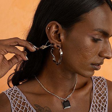 Alluring White Rhodium Blanco Pendant With Black Onyx by Dhwani Bansal