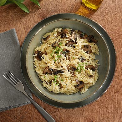 Gibson Elite Berea 16 Piece Plates and Bowls Reactive Glaze Round Dishes Stoneware Dinnerware Set