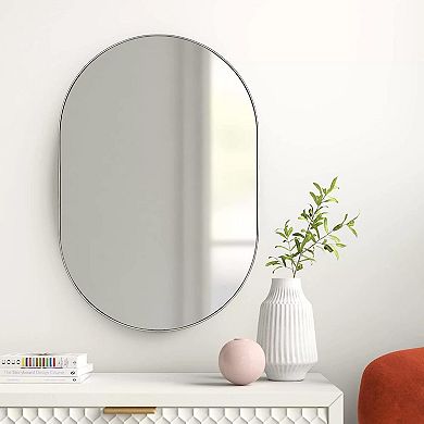 TOEMOA Oval Metal Wall Mirror with Shatterproof Design and Easy Installation