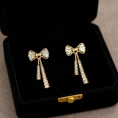 Elegant Bow Drop Earrings with Sparkling Tapered Accents and Delicate Dangling Strands