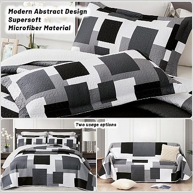 The geometric pattern is reversible on the bedspread set