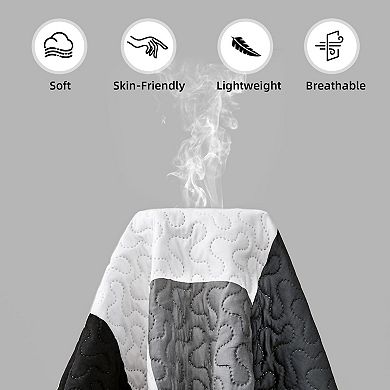 The geometric pattern is reversible on the bedspread set