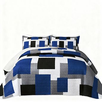 The geometric pattern is reversible on the bedspread set