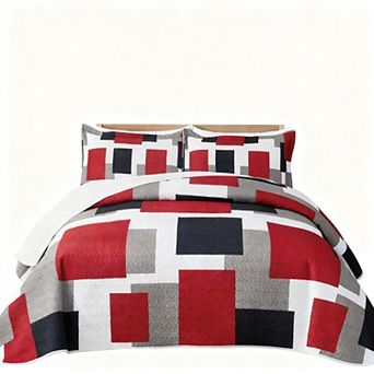 The geometric pattern is reversible on the bedspread set