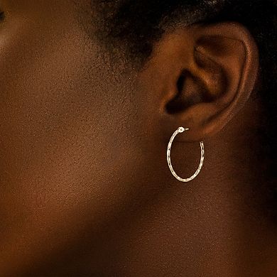 GOLD LUXE® 14k Gold High Polished Twisted Oval Hoop Earrings