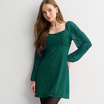 Juniors' Live To Be Spoiled Long Sleeve Mesh Flocked Skater Dress
