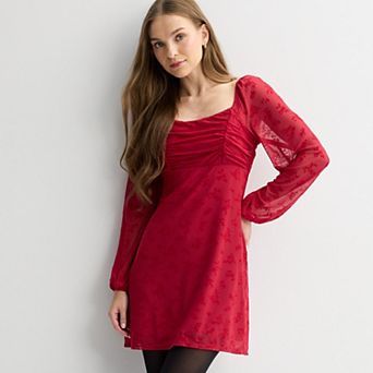 Juniors' Live To Be Spoiled Long Sleeve Mesh Flocked Skater Dress