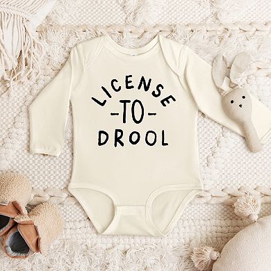 The Juniper Shop License To Drool Long Sleeve Bodysuit