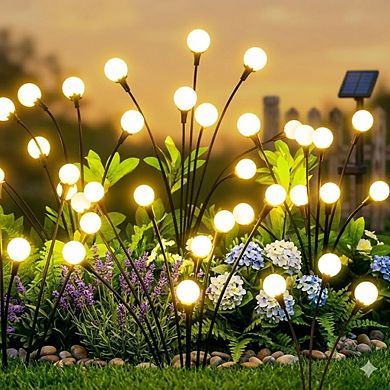 Solar outdoor waterproof lamp set of 4, with 32 LED lights per unit