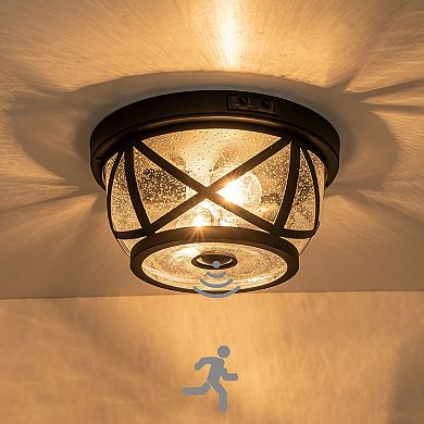 C Cattleya 11-Inch Matte Black Outdoor Motion Sensor Flush Mount Light with Seeded Glass