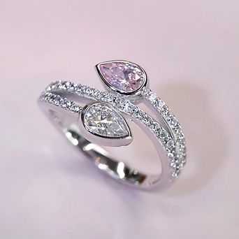 Elegant Dual Teardrop Infinity Ring with Dazzling Stones