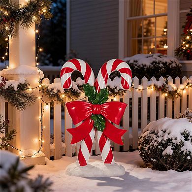 Glitzhome 24"H Christmas Polyresin Candy Cane Porch Decor