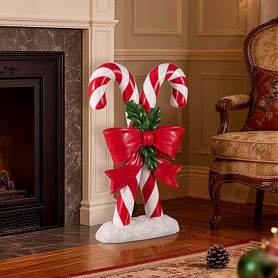 Glitzhome 24"H Christmas Polyresin Candy Cane Porch Decor