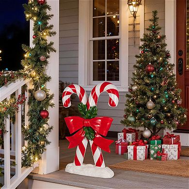 Glitzhome 24"H Christmas Polyresin Candy Cane Porch Decor