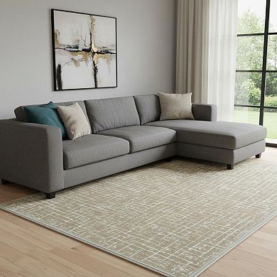 HomeRoots Gold And Ivory Abstract Geometric Distressed Washable Area Rug