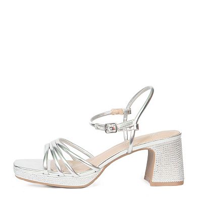 A luminous gold heeled sandal