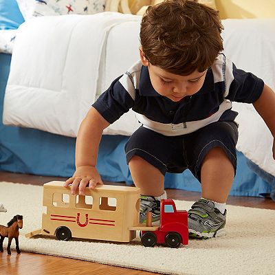 Melissa and doug horse carrier online