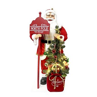 Fraser Hill Farm 3-ft. Musical Santa Claus Statue with North Pole Sign & Tree