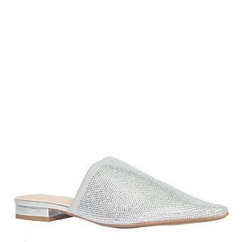 A chic pointed-toe slip-on silhouette mule