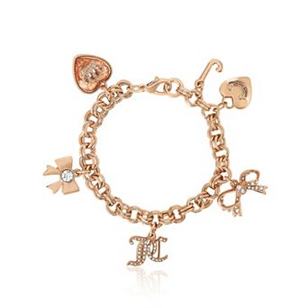 Juicy Couture Gold-Tone Charm Bracelet, Crystal Bow & Logo Charms, 7"