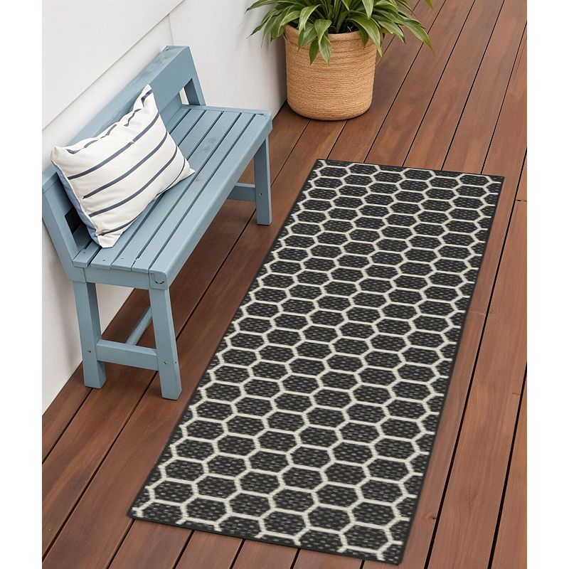 HomeRoots 6' Black And Ivory Geometric Indoor Outdoor Area Rug