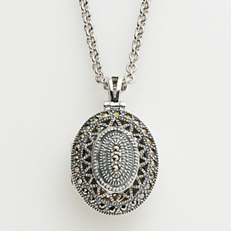 Lavish by TJM Sterling Silver Openwork Oval Locket