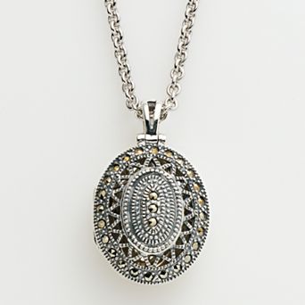 Lavish by TJM Sterling Silver Openwork Oval Locket