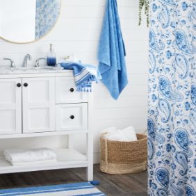 Clean bathroom with matching patterned accents