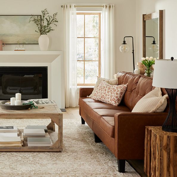 Light colored living room furniture with accents