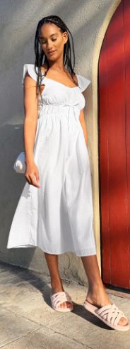 Woman wearing white sundress