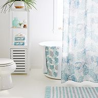 Clean bathroom with matching patterned accents